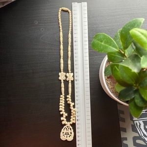 Vintage polished carved bone necklace